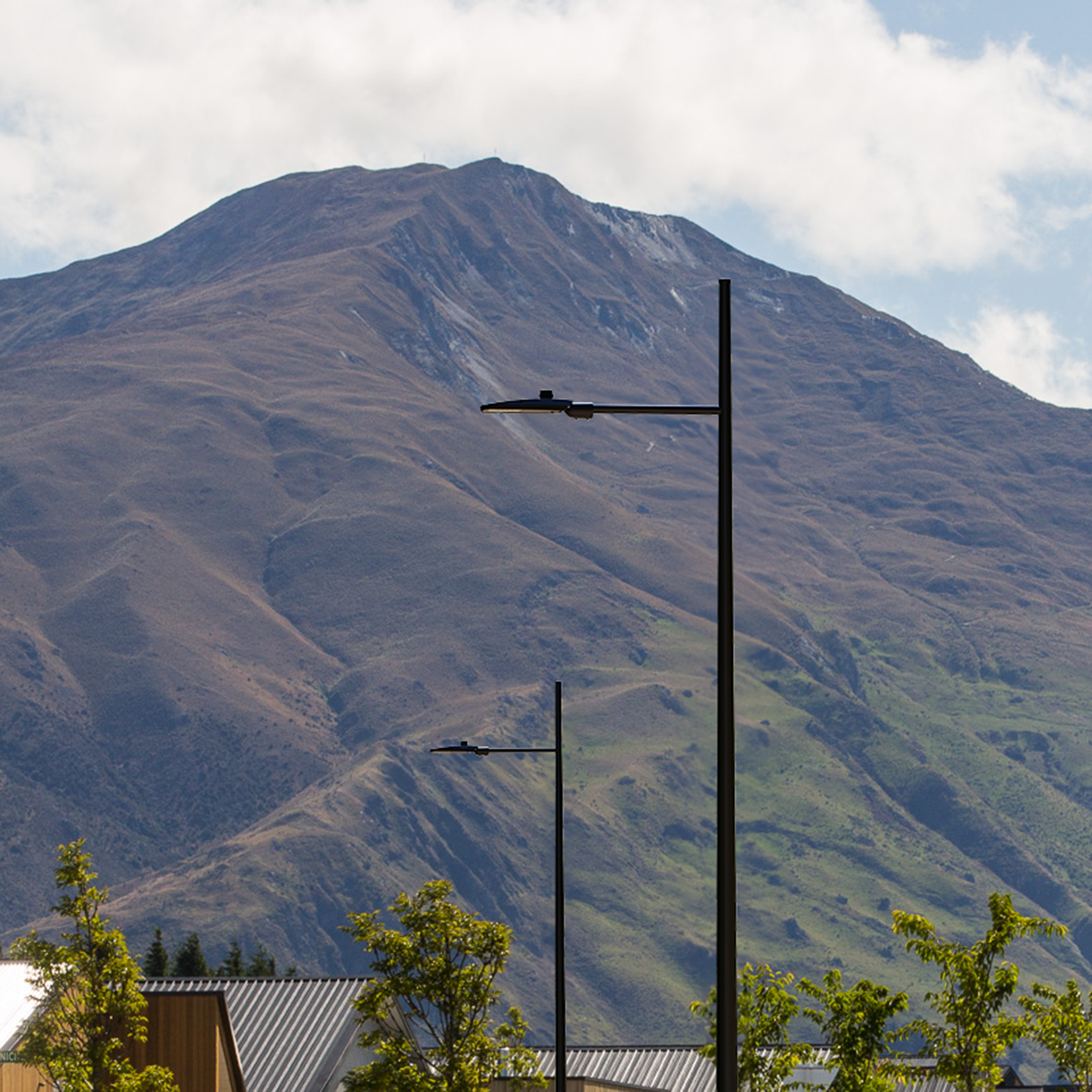 Discover the elegance and innovation of the Marlborough Column with a beautiful mountain at the back.