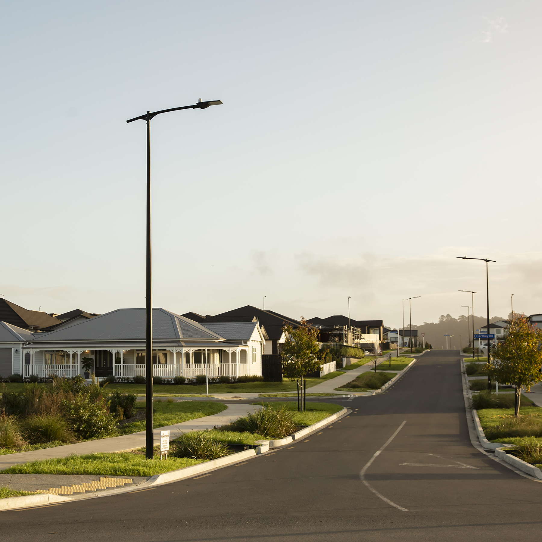 Discover Milford: A versatile Column illuminating a walkway.