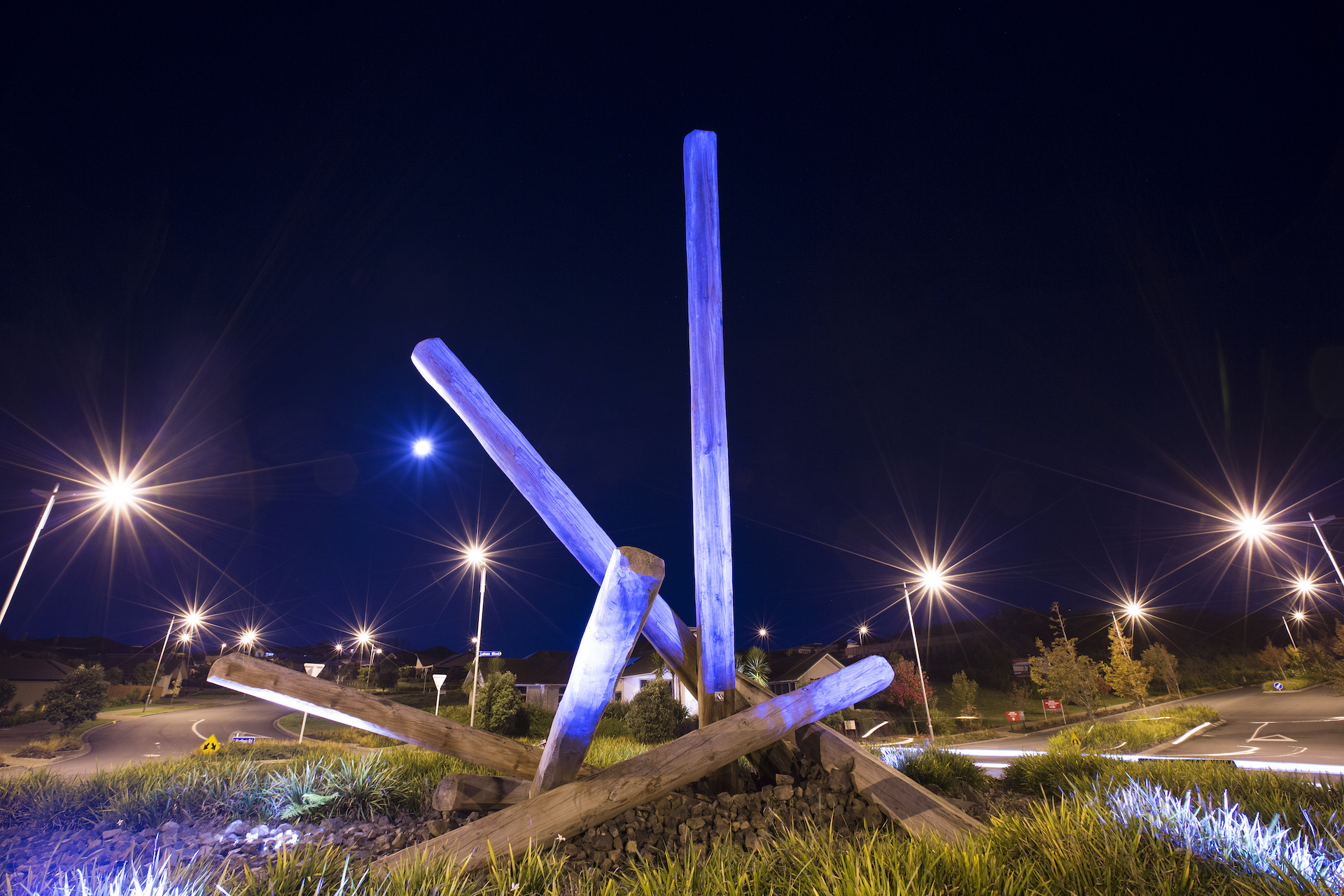 The Lakes roundabout sculpture at night illuminated by ibex lighting solutions.