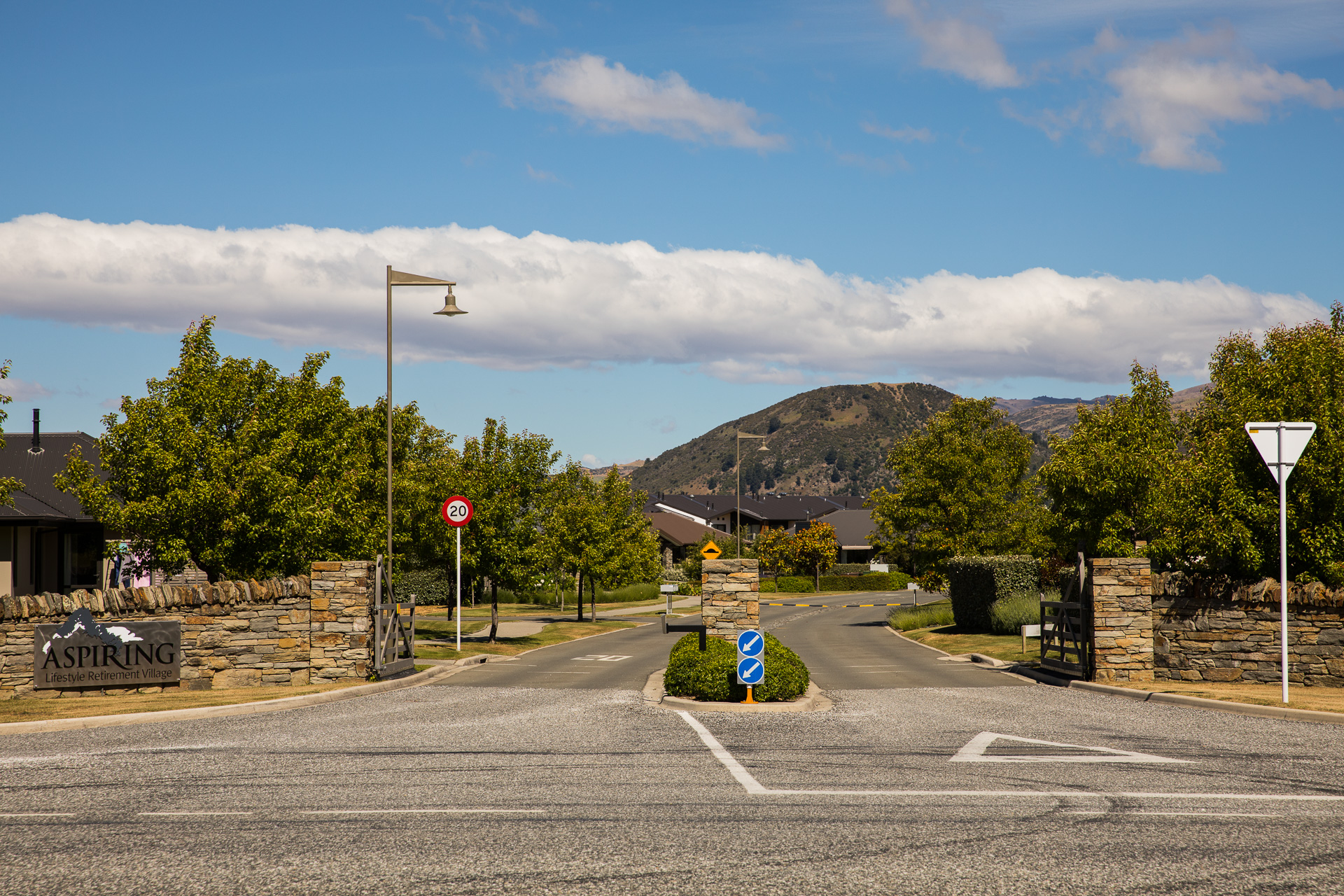 Aspiring retirement village gate, with street light by ibex lighting