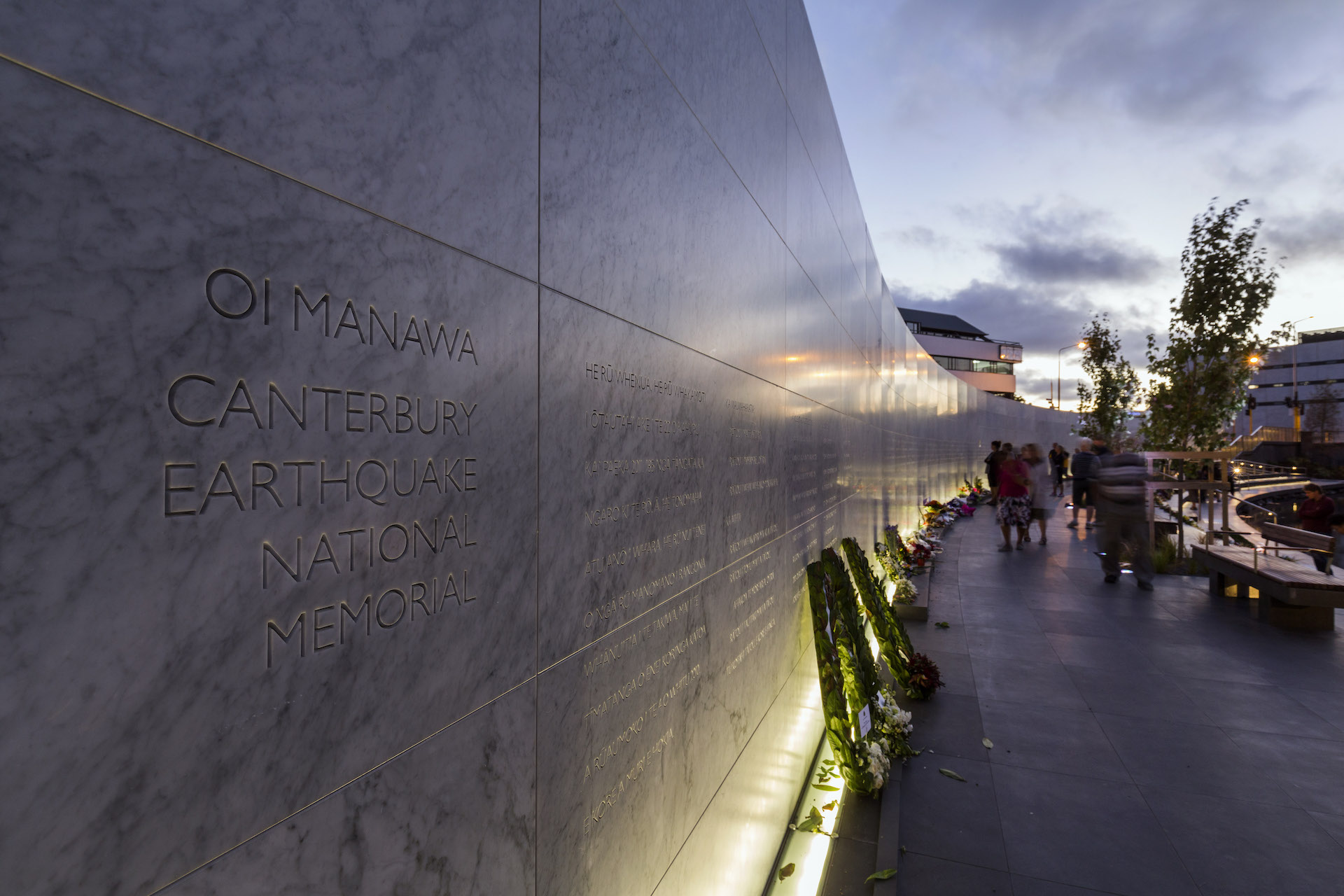 Earthquake memorial wall illuminated by ibex lighting.