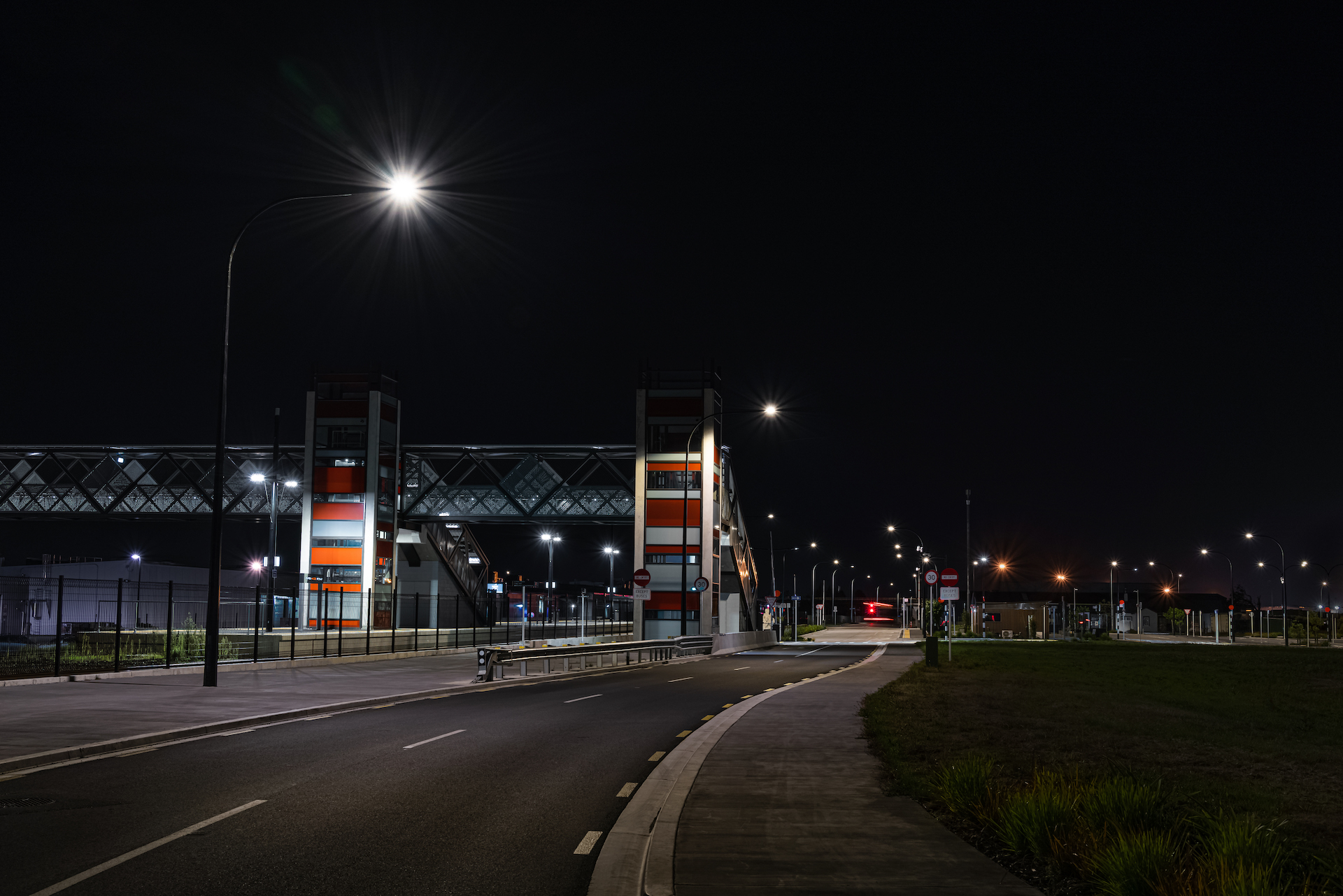 Rotokauri sidewalk at night illuminated by ibex lighting solutions.